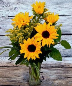 From the land of the midnight sun, these big, bold sunflowers stand tall and bring bold cheer from everyone around. Long lasting and unscented.