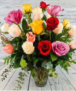 Our Rose Garden is a dream of beauty! Our Designers choose the best-in-shop assorted colors of beautiful, long-stemmed, premium Roses to create this beautiful arrangement. Arranged with care and precision, this abundant array of soft-scents honor the ones you love.